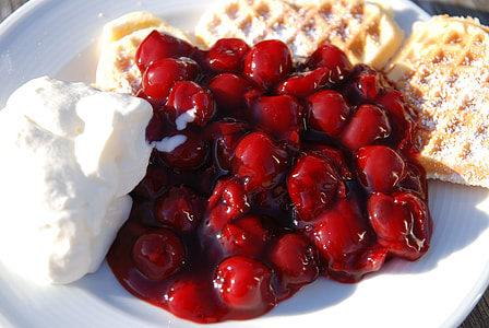 red berries and pancake on white plate thumbnail