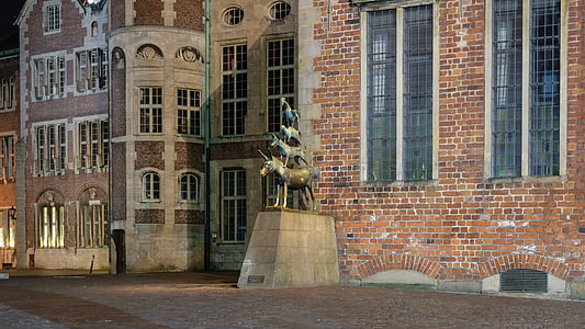 unicorn statue beside building thumbnail