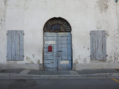 posters on closed door thumbnail