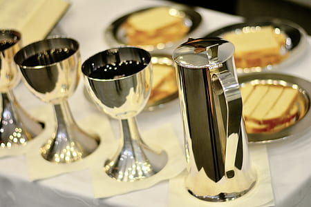 food photography of stainless steel pitcher and golblets thumbnail