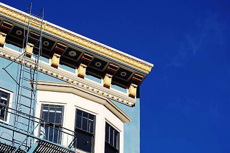 blue concrete building under blue sky at daytime thumbnail