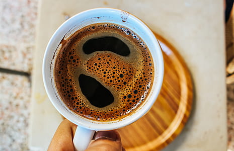 Person Holding Cup With Coffee thumbnail