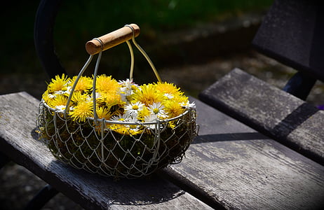yellow and white flowers in gray steel basket thumbnail