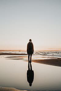 person standing seashore thumbnail