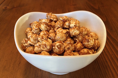 caramel popcorn in white ceramic bowl thumbnail