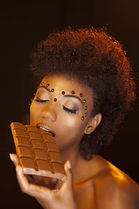 woman eating chocolate bar thumbnail