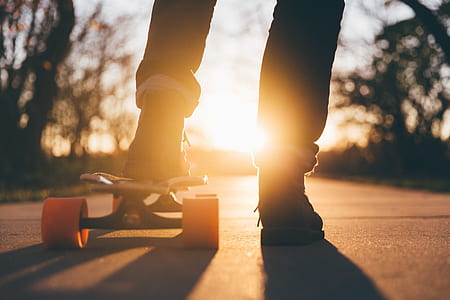 person on white longboard thumbnail