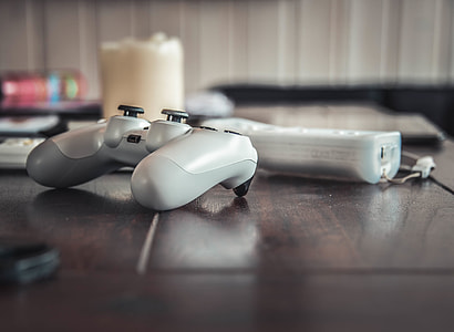 white and gray game controller thumbnail