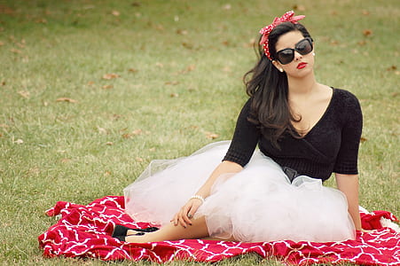Woman Wearing Sunglasses And Black Top thumbnail