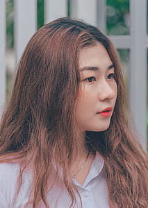 Woman Wears White Button-up Shirt and Silver-colored Necklace thumbnail