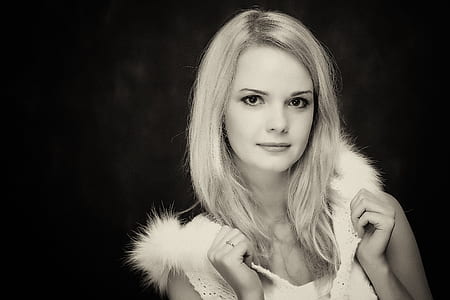 woman taking picture with serious face thumbnail