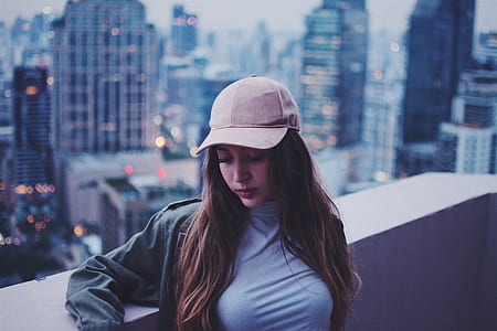 woman wearing gray jacket kneading on the terrace thumbnail