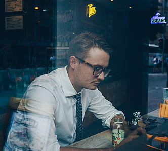 man sitting on a store thumbnail