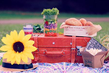 yellow Sunflower flower near red leather case thumbnail