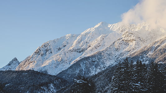 snow-covered mountain under clear blue sky during daytime thumbnail