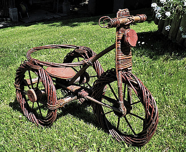 brown wooden trike plant pot rack on lawn thumbnail