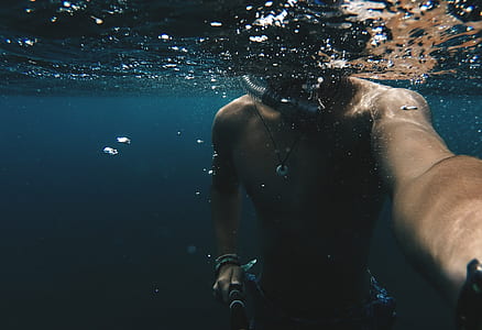 man swim in water thumbnail
