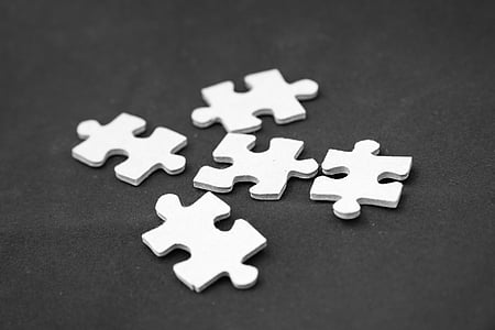 five white puzzle pieces thumbnail