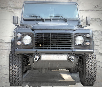 black SUV with lens flare thumbnail