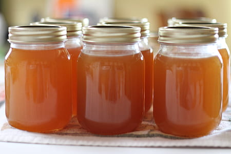 several clear glass jars on white table thumbnail