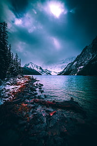 photography of river with mountains thumbnail