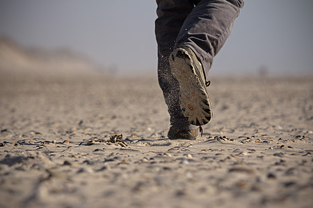 person running during daytime thumbnail