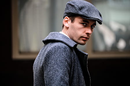 Man in Gray Coat Photo thumbnail