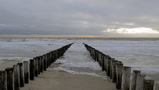 seashore with wooden posts thumbnail