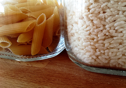 pasta and grain in clear glass jars thumbnail