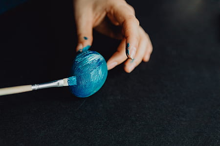 Woman Painting Easter Eggs thumbnail