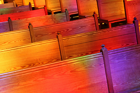 close up photo of brown and red wooden benches thumbnail