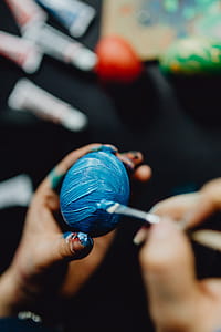Woman Painting Easter Eggs thumbnail