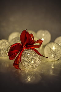 red ribbon on LED ball thumbnail