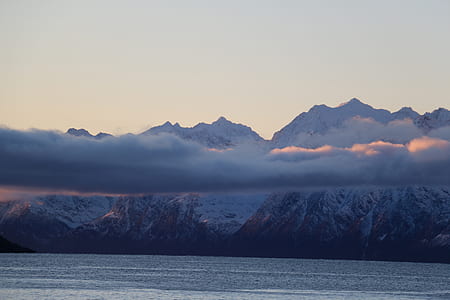 photo of mountains covered with mountains thumbnail