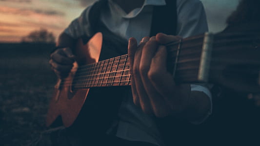 man playing guitar thumbnail
