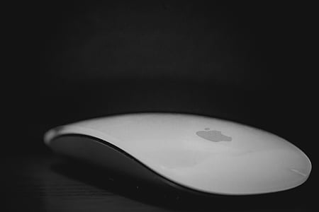 Apple Magic Mouse on gray surface thumbnail