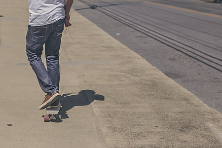man riding on skateboard thumbnail