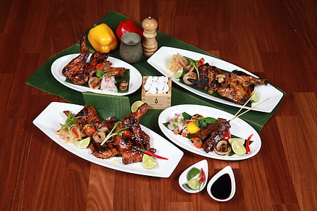 roasted chicken on white ceramic plates thumbnail