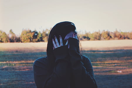 woman covering her face with hands thumbnail