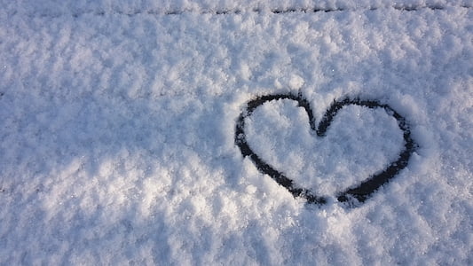 close-up photo of heart shape snow thumbnail