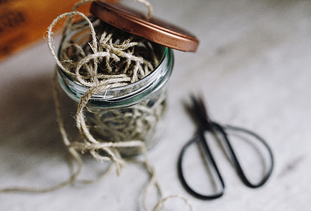 Thread in a jar and a paintbrush thumbnail