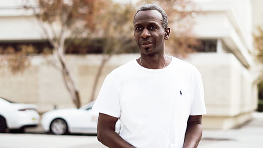 man wearing white crew-neck top thumbnail