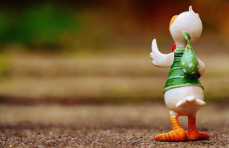 white ceramic duck figurine thumbnail