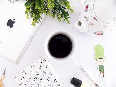mug near teapot and iPad thumbnail