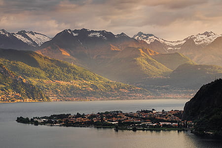 landscape photo of body of water near mountain thumbnail