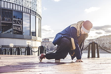 Man in Blue and Yellow Jacket Dancing thumbnail