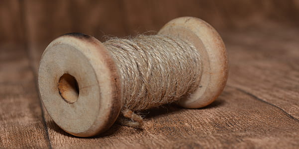 beige string with spool thumbnail