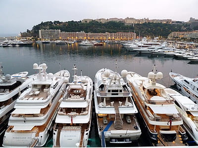 boats on body of water during daytime thumbnail