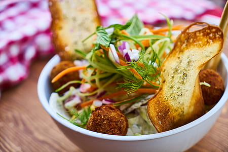 selective focus photo of salad dish on white ceramic bowl thumbnail