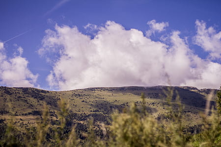 mountain under party clouds thumbnail